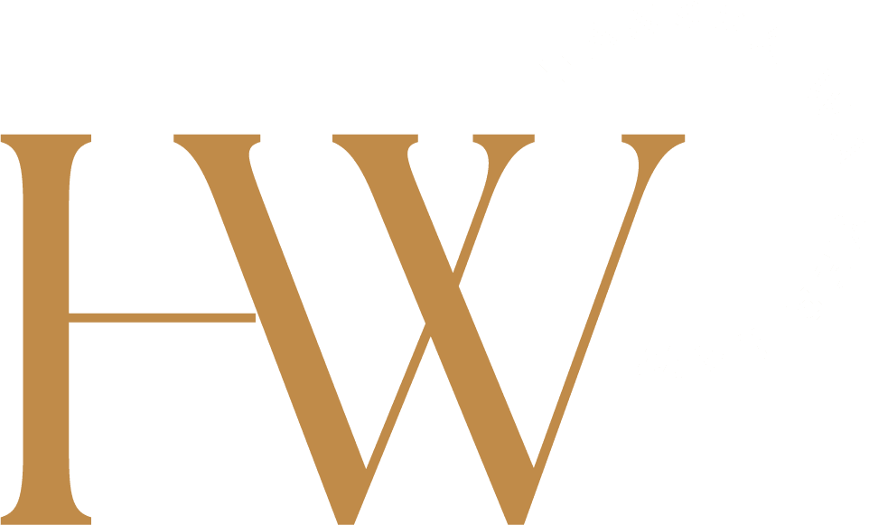 Stylized letter 'W' in beige with partial circular text on a brown background.